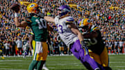 Green Bay Packers quarterback Jordan Love (10) throws the ball away under pressure from Minnesota Vikings linebacker Andrew Van Ginkel (43) on Sunday, September 29, 2024, at Lambeau Field in Green Bay, Wis. The Vikings won the game, 31-29.