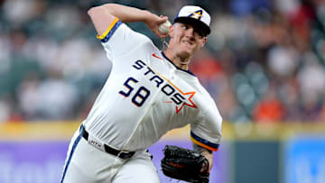 Apr 21, 2025; Houston, Texas, USA; Houston Astros starting pitcher Hunter Brown (58) delivers a pitch against the Toronto Blue Jays during the first inning at Daikin Park.