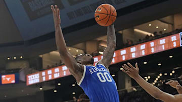 Feb 15, 2025; Austin, Texas, USA; Kentucky Wildcats guard Otega Oweh (0) grabs a rebound during the first half against the Texas Longhorns at Moody Center. Mandatory Credit: Scott Wachter-Imagn Images
