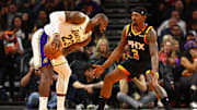 Nov 26, 2024; Phoenix, Arizona, USA; Los Angeles Lakers forward LeBron James (23) against Phoenix Suns guard Bradley Beal (3) during an NBA Cup game at Footprint Center. Mandatory Credit: Mark J. Rebilas-Imagn Images