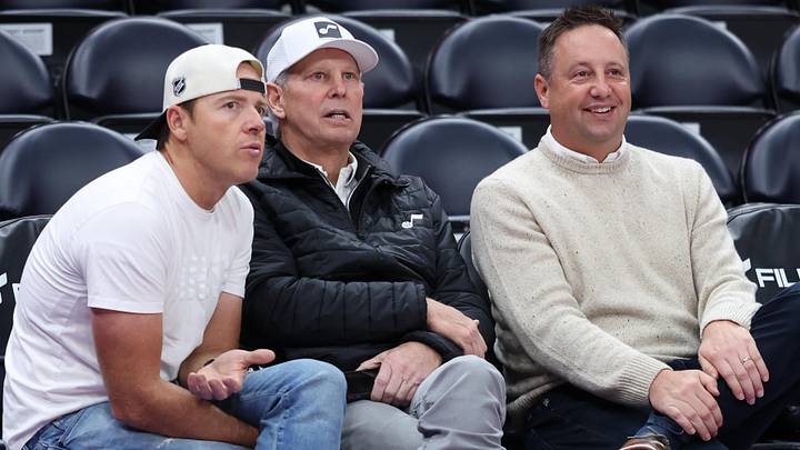 Jan 30, 2026; Salt Lake City, Utah, USA; Utah Jazz Owner Ryan Smith (left) and CEO of basketball operations Danny Ainge (middle) along with president of basketball operations Austin Ainge watch warm ups before a game against the Brooklyn Nets at Delta Center. Mandatory Credit: Rob Gray-Imagn Images