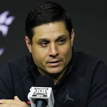 Oct 23, 2024; Kansas City, MO, USA; Cincinnati Bearcats head coach Wes Miller talks to media during the Big 12 Men’s Basketball Media Day at T-Mobile Center. Mandatory Credit: Jay Biggerstaff-Imagn Images