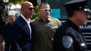 Penn State athletic director Pat Kraft, right, greets head football coach James Franklin outside Beaver Stadium before an NCAA football game. 