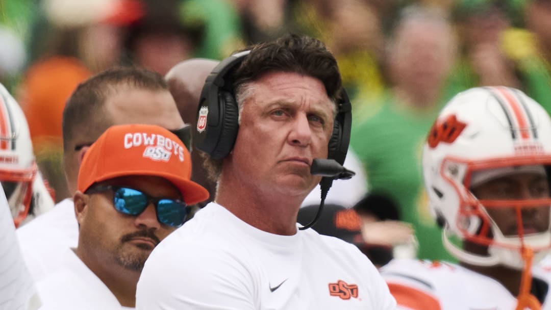 Sep 6, 2025; Eugene, Oregon, USA; Oklahoma State Cowboys head coach Mike Gundy looks up from the sidelines during the first half in a game against the Oregon Ducks at Autzen Stadium. Mandatory Credit: Troy Wayrynen-Imagn Images