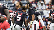 Oct 27, 2024; Houston, Texas, USA;  Houston Texans quarterback C.J. Stroud (7) low fives safety Jalen Pitre (5) after he was introduced before playing against the Indianapolis Colts in the first quarter at NRG Stadium. Mandatory Credit: Thomas Shea-Imagn Images