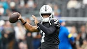 Nov 2, 2025; Paradise, Nevada, USA;  Las Vegas Raiders quarterback Geno Smith (7) warms up before the game against the Jacksonville Jaguars at Allegiant Stadium. Mandatory Credit: Stephen R. Sylvanie-Imagn Images