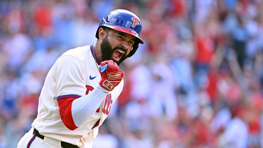 Aug 9, 2026; Philadelphia, Pennsylvania, USA;  Philadelphia Phillies center fielder Derek Hill (49) celebrates his walk-off RBI single during the twelfth inning against the Toronto Blue Jays at Citizens Bank Park. Mandatory Credit: Eric Hartline-Imagn Images