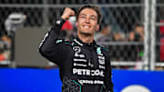 Mercedes AMG Petronas driver George Russell celebrates his race victory of the Las Vegas Grand Prix.