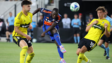Kévin Denkey (middle) scored the opener in his first Hell is Real derby.