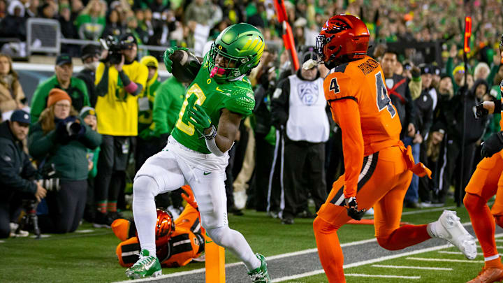 Oregon running back Bucky Irving scores a touchdown as the No. 6 Oregon Ducks take on the No. 16 Oregon State Beavers Friday, Nov. 24, 2023, at Autzen Stadium in Eugene, Ore.