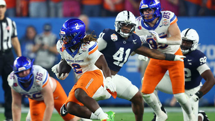 Dec 31, 2024; Glendale, AZ, USA; Boise State Broncos running back Ashton Jeanty (2) rushes the ball against the Penn State Nittany Lions during the first half in the Fiesta Bowl at State Farm Stadium. Mandatory Credit: Mark J. Rebilas-Imagn Images Dec 31, 2024; Glendale, AZ, USA; Boise State Broncos running back Ashton Jeanty (2) rushes the ball against the Penn State Nittany Lions during the first half in the Fiesta Bowl at State Farm Stadium. Mandatory Credit: Mark J. Rebilas-Imagn Images