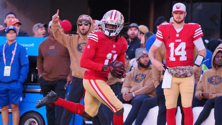 Nov 19, 2023; Santa Clara, California, USA; San Francisco 49ers wide receiver Brandon Aiyuk (11) makes a catch for a 76-yard touchdown against the Tampa Bay Buccaneers during the third quarter at Levi's Stadium. Mandatory Credit: Kelley L Cox-USA TODAY Sports