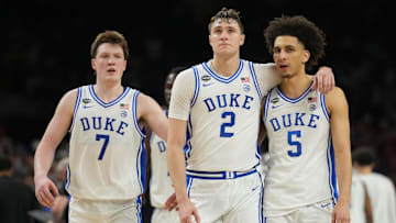 Duke Blue Devils forward Cooper Flagg and guard Tyrese Proctor react against the Houston Cougars in the 2025 NCAA Tournament