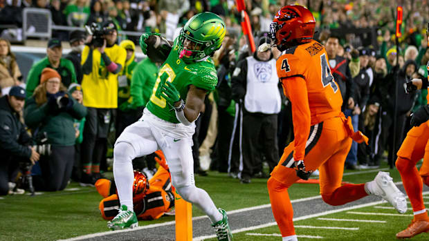 Oregon running back Bucky Irving scores a touchdown as the No. 6 Oregon Ducks take on the No. 16 Oregon State Beavers.