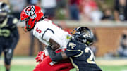 Sep 11, 2025; Winston-Salem, North Carolina, USA;  North Carolina State Wolfpack wide receiver Noah Rogers (5) runs against Wake Forest Demon Deacons defensive back Ladarius Webb Jr. (20) in first half at Allegacy Federal Credit Union Stadium. Mandatory Credit: Luke Jamroz-Imagn Images