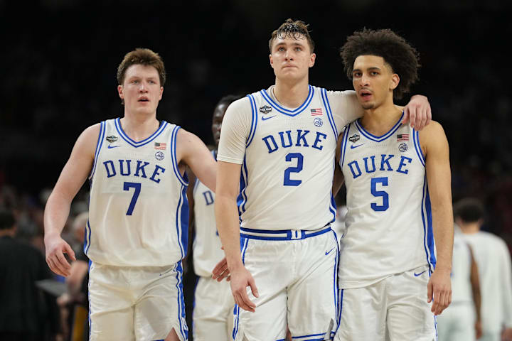 Duke Blue Devils forward Cooper Flagg and guard Tyrese Proctor react against the Houston Cougars. 