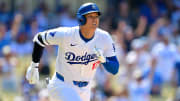 Jul 25, 2024; Los Angeles, California, USA; Los Angeles Dodgers designated hitter Shohei Ohtani (17) runs after hitting a solo home run against the San Francisco Giants during the eighth inning at Dodger Stadium. Mandatory Credit: Gary A. Vasquez-USA TODAY Sports