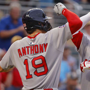 Jul 28, 2025; Minneapolis, Minnesota, USA; Boston Red Sox third baseman Alex Bregman (2) celebrates his three run home run against the Minnesota Twins with left fielder Roman Anthony (19) in the fifth inning at Target Field. Mandatory Credit: Bruce Kluckhohn-Imagn Images