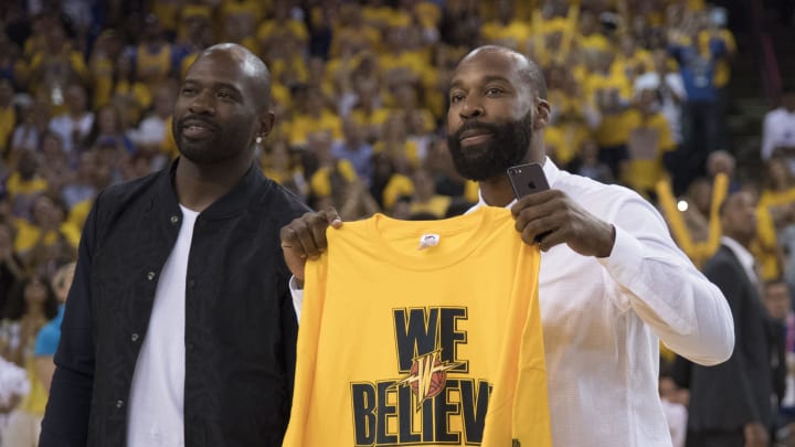 May 2, 2017; Oakland, CA, USA; Golden State Warriors former players Jason Richardson (left) and Baron Davis (right) stand on the court after the first quarter in game one of the second round of the 2017 NBA Playoffs against the Utah Jazz at Oracle Arena. Mandatory Credit: Kyle Terada-USA TODAY Sports