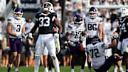 Oct 11, 2025; University Park, Pennsylvania, USA; Penn State Nittany Lions defensive end Dani Dennis-Sutton (33) reacts following a tackle during the second quarter against the Northwestern Wildcats at Beaver Stadium. Mandatory Credit: Matthew O'Haren-Imagn Images