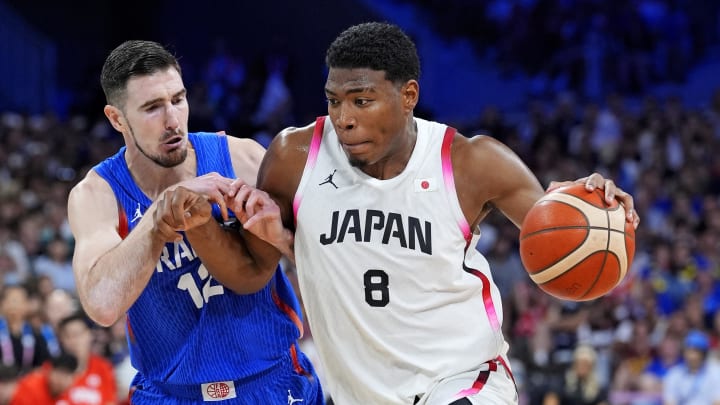 Japan small forward Rui Hachimura (8) drives to the basket.