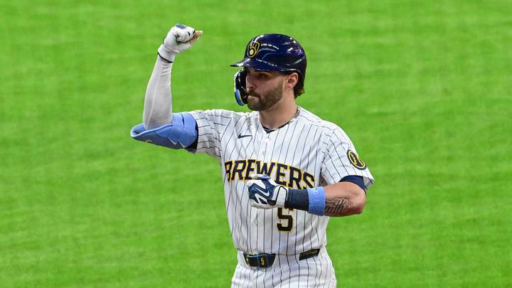 Mar 28, 2026; Milwaukee, Wisconsin, USA;  Milwaukee Brewers center fielder Garrett Mitchell (5) reacts after driving in two runs with a base hit against the Chicago White Sox in the first inning at American Family Field. Mandatory Credit: Benny Sieu-Imagn Images