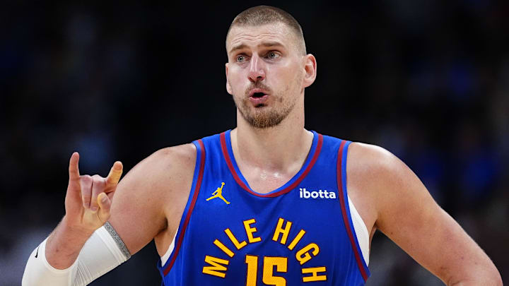 Apr 20, 2026; Denver, Colorado, USA; Denver Nuggets center Nikola Jokic (15) reacts towards the bench in the second half against the Minnesota Timberwolves during game two of the first round of the 2026 NBA Playoffs at Ball Arena. Mandatory Credit: Ron Chenoy-Imagn Images