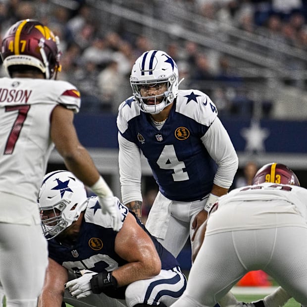 Dallas Cowboys quarterback Dak Prescott in action during the game against the Washington Commanders at AT&T Stadium 