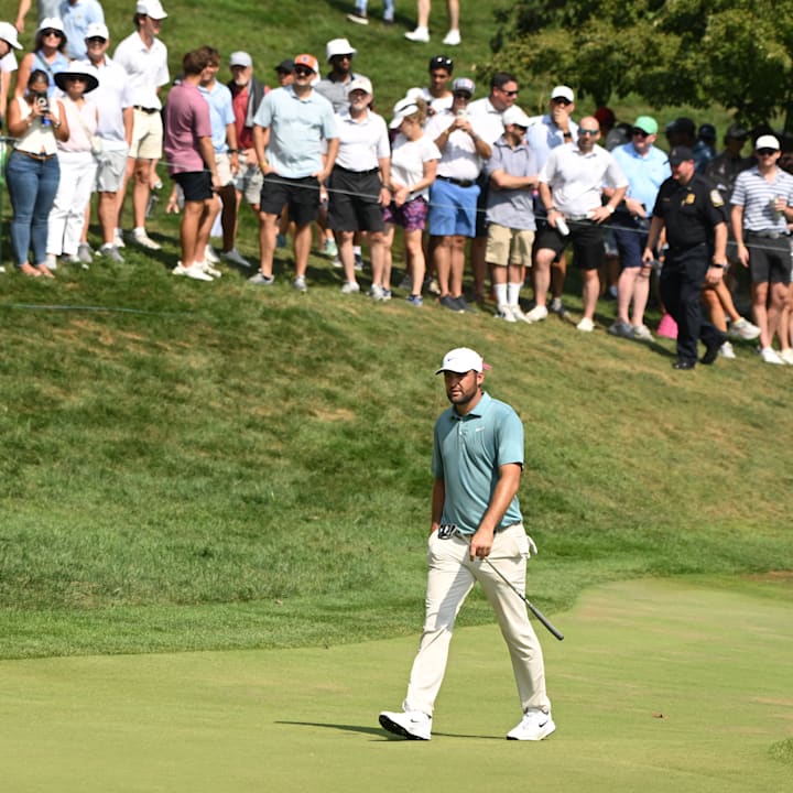 Scottie Scheffler walks on the green on the ninth hole during the final round of the BMW Championship golf tournament