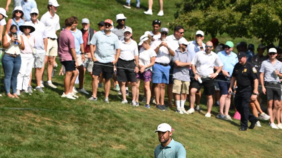 Scottie Scheffler walks on the green on the ninth hole during the final round of the BMW Championship golf tournament