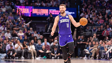 Feb 24, 2025; Sacramento, California, USA; Sacramento Kings forward Domantas Sabonis (11) brings the ball up the court during the second quarter of the game against the Charlotte Hornets at Golden 1 Center. Mandatory Credit: Ed Szczepanski-Imagn Images
