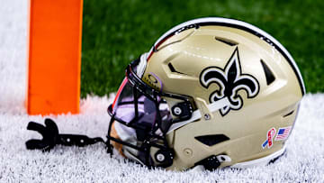 Sep 8, 2024; New Orleans, Louisiana, USA;  Detailed view of the New Orleans Saints football helmet before the game against the Carolina Panthers during the pregame at Caesars Superdome. Mandatory Credit: Stephen Lew-Imagn Images
