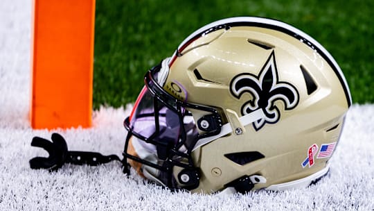 Sep 8, 2024; New Orleans, Louisiana, USA;  Detailed view of the New Orleans Saints football helmet before the game against the Carolina Panthers during the pregame at Caesars Superdome. Mandatory Credit: Stephen Lew-Imagn Images