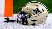 Sep 8, 2024; New Orleans, Louisiana, USA;  Detailed view of the New Orleans Saints football helmet before the game against the Carolina Panthers during the pregame at Caesars Superdome. Mandatory Credit: Stephen Lew-Imagn Images