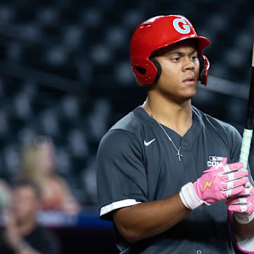 Jun 17, 2025; Phoenix, AZ, USA; Glendale High School (MO) infielder Sebastian Norman during the MLB Draft Combine high school baseball game at Chase Field. Norman had the hardest hit ball at the combine (113.8 mph) and furthest drive (417 feet). Mandatory Credit: Mark J. Rebilas-Imagn Images