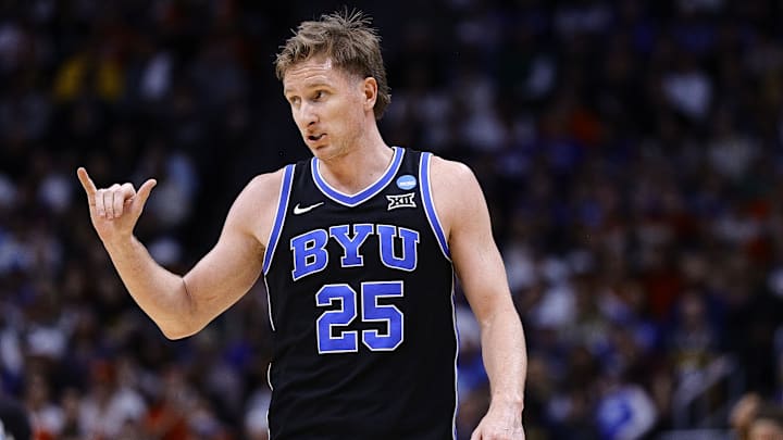 Mar 22, 2025; Denver, CO, USA; Brigham Young Cougars guard Dawson Baker (25) reacts against the Wisconsin Badgers during the second half in the second round of the NCAA Tournament  at Ball Arena. Mandatory Credit: Isaiah J. Downing-Imagn Images