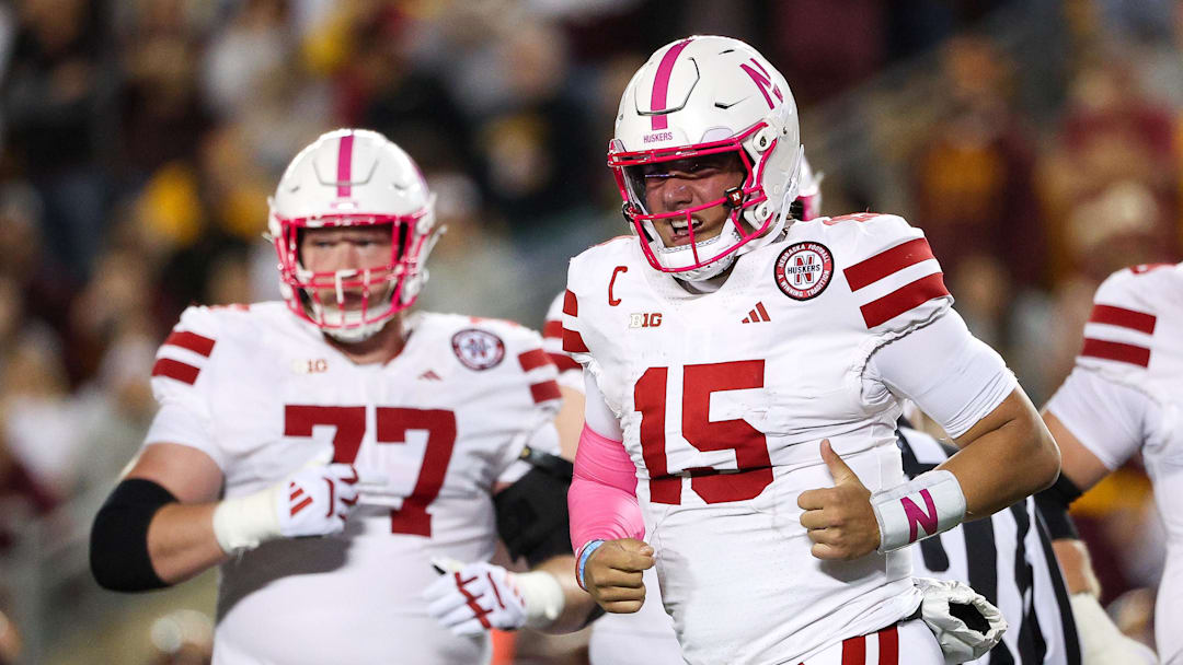 Nebraska Cornhuskers quarterback Dylan Raiola (15) runs off the field during the first half against the Minnesota Golden Gophers at Huntington Bank Stadium.