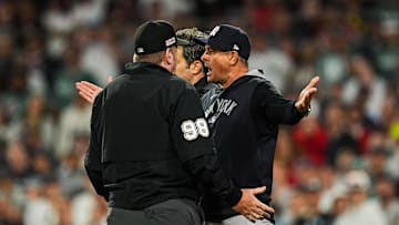 Jun 13, 2025; Boston, Massachusetts, USA; New York Yankees manager Aaron Boone (17) has words with the officials as they take on the Boston Red Sox in the tenth inning at Fenway Park. Mandatory Credit: David Butler II-Imagn Images