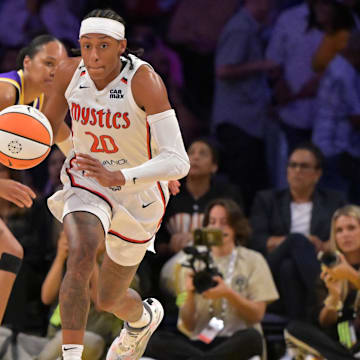 Jul 15, 2025; Los Angeles, California, USA;Washington Mystics guard Brittney Sykes (20) steals the ball from Los Angeles Sparks forward Azura Stevens (23) and takes it down court during the second half at Crypto.com Arena. Mandatory Credit: Jayne Kamin-Oncea-Imagn Images