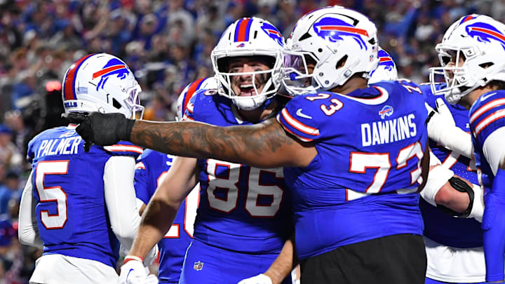 Sep 7, 2025; Orchard Park, New York, USA; Buffalo Bills tight end Dalton Kincaid (86) and offensive tackle Dion Dawkins (73) reacts after a play against the Baltimore Ravens