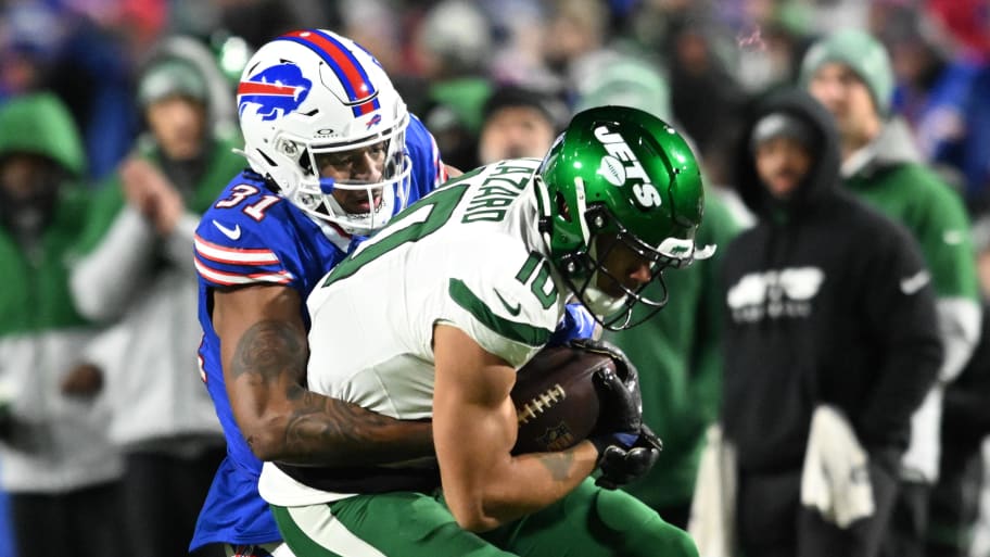 Nov 19, 2023; Orchard Park, NY; Buffalo Bills cornerback Rasul Douglas (31)makes a tackle on New York Jets wide receiver Allen Lazard (10) in the third quarter at Highmark Stadium.  | Mark Konezny-USA TODAY Sports