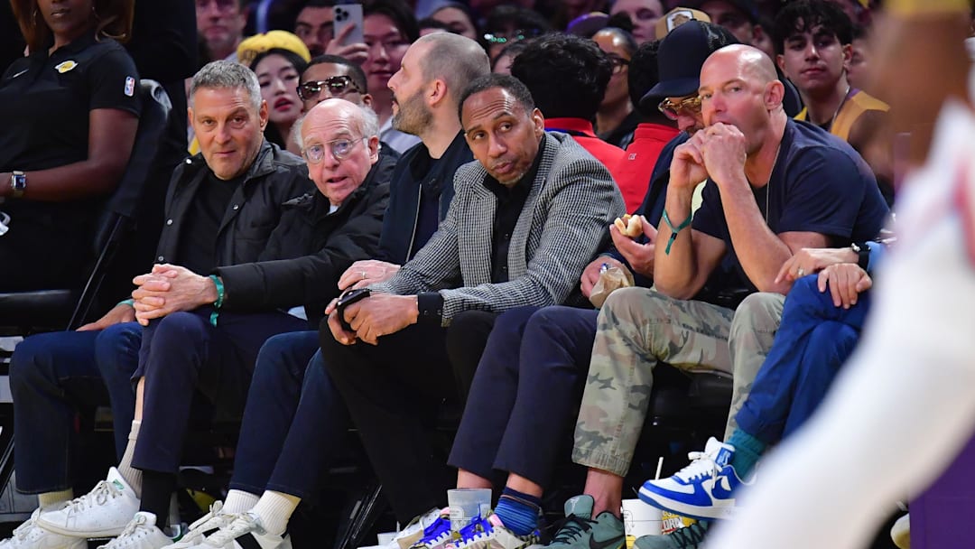 Mar 6, 2025; Los Angeles, California, USA; Comedian and writer Larry David and sports media personality Stephen A. Smith attend the game between the Los Angeles Lakers and New York Knicks  at Crypto.com Arena. Mandatory Credit: Gary A. Vasquez-Imagn Images
