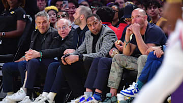 Mar 6, 2025; Los Angeles, California, USA; Comedian and writer Larry David and sports media personality Stephen A. Smith attend the game between the Los Angeles Lakers and New York Knicks  at Crypto.com Arena. Mandatory Credit: Gary A. Vasquez-Imagn Images