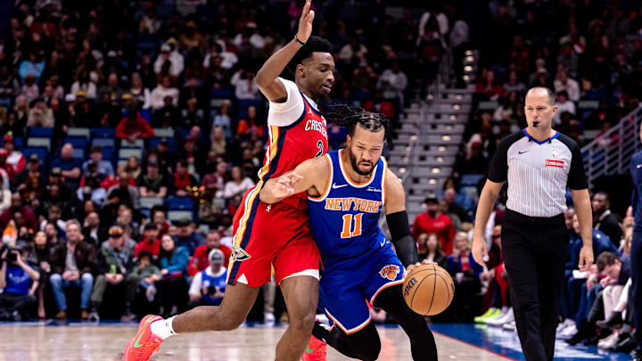 Dec 21, 2024; New Orleans, Louisiana, USA; New York Knicks guard Jalen Brunson (11) dribbles the ball against New Orleans Pelicans forward Herbert Jones (2) during the first half at Smoothie King Center. Mandatory Credit: Stephen Lew-Imagn Images Dec 21, 2024; New Orleans, Louisiana, USA; New York Knicks guard Jalen Brunson (11) dribbles the ball against New Orleans Pelicans forward Herbert Jones (2) during the first half at Smoothie King Center. Mandatory Credit: Stephen Lew-Imagn Images