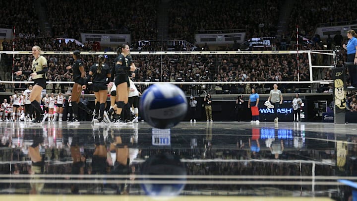 Purdue celebrates during an NCAA women’s volleyball match against Indiana at Mackey Arena