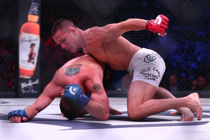  Pico (red gloves) fights Lee Morrison (blue gloves) during Bellator 199 at SAP Center. 