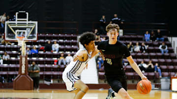 Logan-Rogersville's Chase Branham drives to the basket as the Wildcats took on the Sparta Trojans at Hammons Student Center in a first round Blue Division matchup during the Blue and Gold Tournament on Thursday, Dec. 26, 2024.