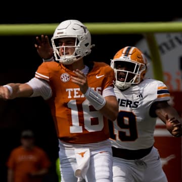 Texas football player, Arch Manning, throws the ball during a football game against UTEP 