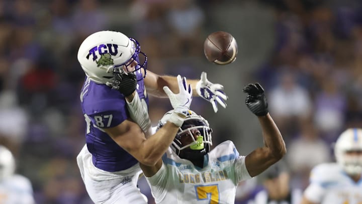 Sep 7, 2024; Fort Worth, Texas, USA; TCU Horned Frogs wide receiver Blake Nowell (87) cannot catch a pass while defended by Long Island Sharks defensive back Nate Wyatt (7) in the second half at Amon G. Carter Stadium. Mandatory Credit: Tim Heitman-Imagn Images