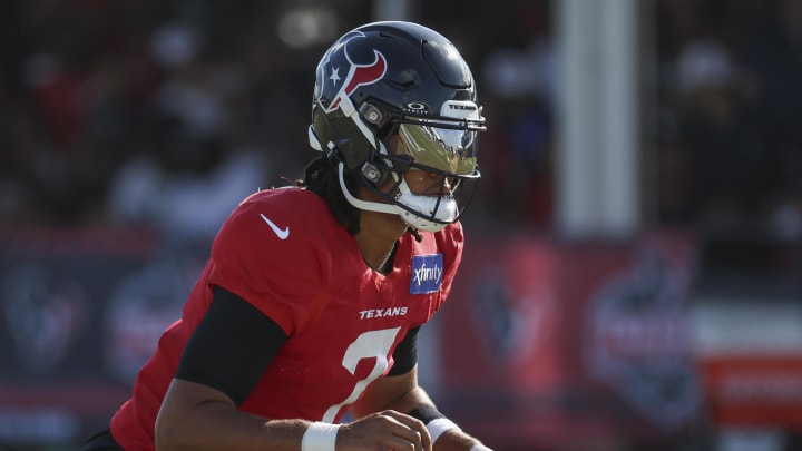 Jul 29, 2024; Houston, TX, USA; Houston Texans quarterback C.J. Stroud (7) during training camp at Houston Methodist Training Center. Mandatory Credit: Troy Taormina-USA TODAY Sports